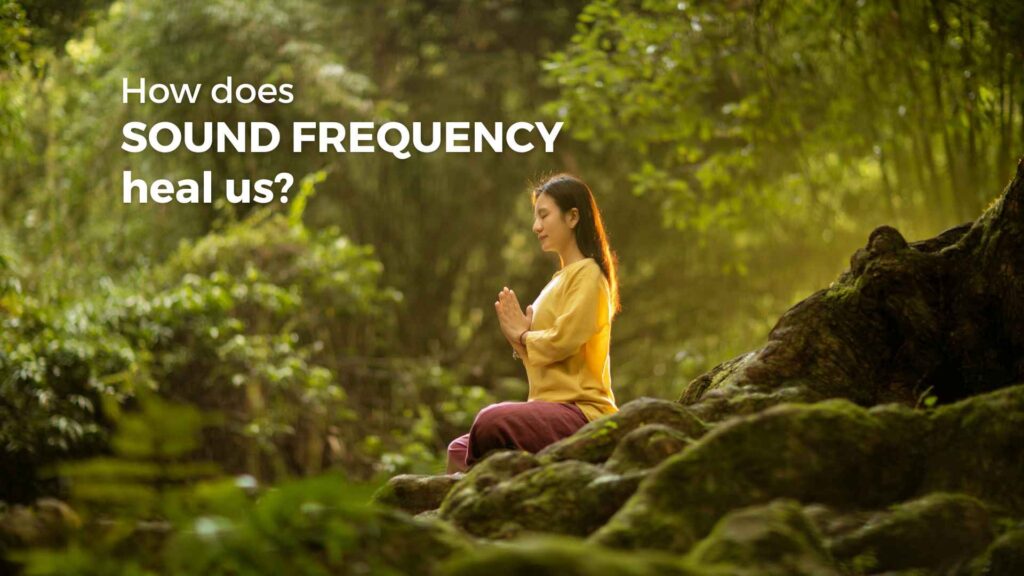 how does sound frequency heal us - person meditating surrounded by natural sounds